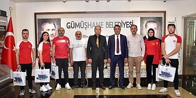 BAŞER   MİLLİ ANTRENÖR VE SPORCULAR İLE BİR ARAYA GELDİ.