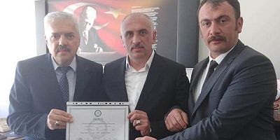 Temel Özcan Mazbatasını Aldı.