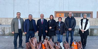 Trabzon Gümüşhaneliler Derneği, öğrencilere kışlık kıyafet ve kitap desteğinde bulundu